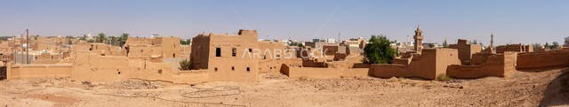Al-Munaikh Castle in Al-Majma'ah area, ancient mud buildings, tourist attractions, ancient historical landmarks, old-style architectural designs, famous heritage tourist places in the Kingdom of Saudi Arabia