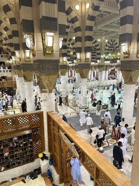 Gathering of worshipers inside the Prophet's Mosque, the Mosque of the Messenger of God in Medina, Kingdom of Saudi Arabia, performing prayers in the Prophet's Mosque and entering the Noble Garden, worship and drawing closer to God, sacred and famous Islamic places and landmarks around the world
