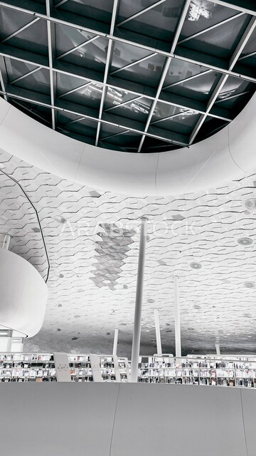 The beauty and splendor of the interior design of the Ithra Library in the city of Dhahran in the King Abdulaziz Center for World Culture, a wonderful cultural edifice, Kingdom of Saudi Arabia