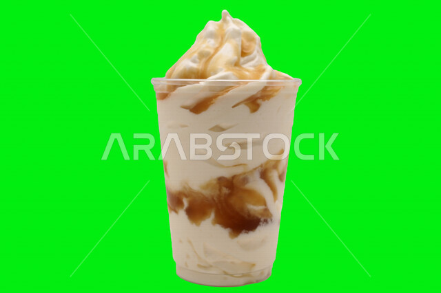 Croma delicious milkshake pictorial on green background, cold drinks, milkshake with caramel and whipped cream flavor, cold delicious dessert