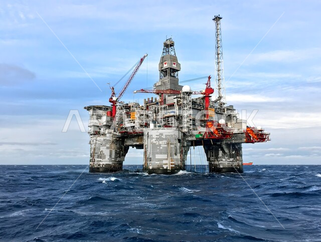 Quality of tools and equipment for petroleum industry and storage, extraction and export of underground resources, close-up of an oil platform in the middle of the sea, huge drilling machines, extraction of oils and gases in the Kingdom of Saudi Arabia