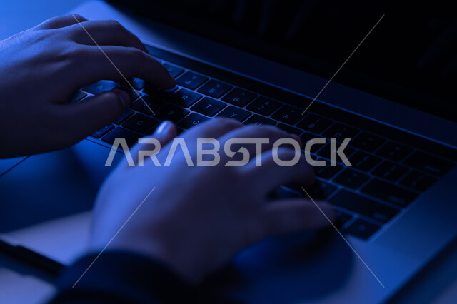 Keyboard clicking, text content creation, data entry concept, close up of a gab of a Saudi Arabian Gulf woman's hands using a laptop, young Emirati woman typing on a laptop, integrating modern technology into work life, office administrative jobs and professions