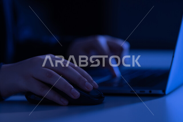 Keyboard clicking, text content creation, data entry concept, close up of a gab of a Saudi Arabian Gulf woman's hands using a laptop, young Emirati woman typing on a laptop, integrating modern technology into work life, office administrative jobs and professions