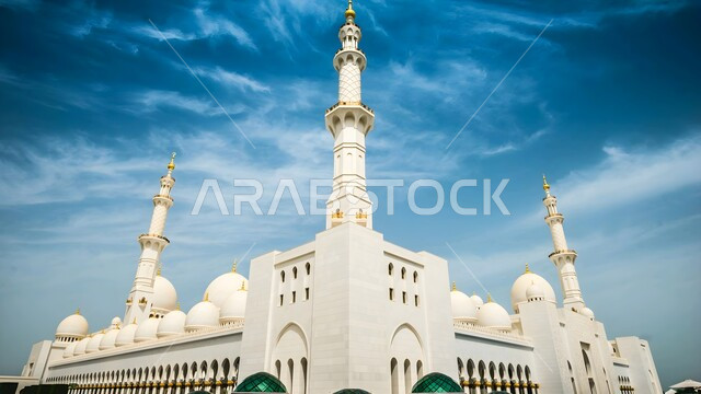 Sheikh Zayed bin Sultan Al Nahyan Mosque in Abu Dhabi, the architectural art of building mosques in the Islamic style, Islamic religious landmarks in the United Arab Emirates, the call of Muslims to perform religious duties and prayers, the concept of worship and drawing closer to God Almighty