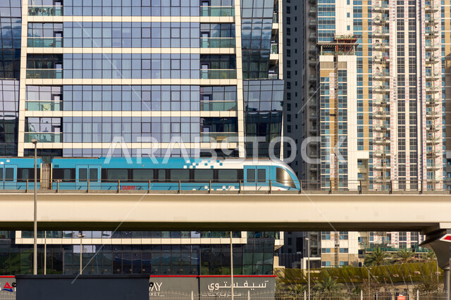 Modern land transportation, Dubai Metro runs on the railway via Sheikh Zayed Road, passenger arrival stations, providing facilities and services for those leaving and arriving in the United Arab Emirates, the concept of public transportation, attention to the infrastructure of bridges and roads