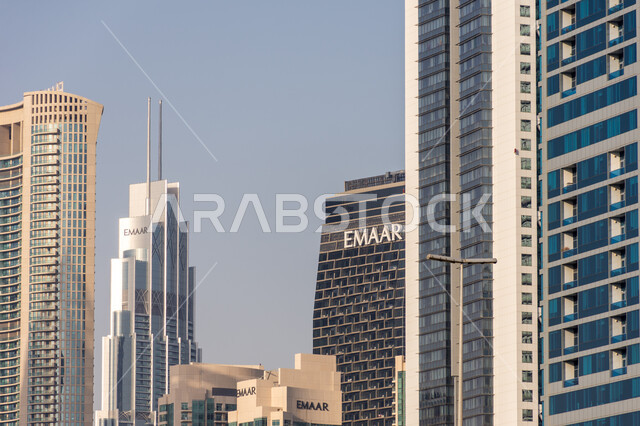 Emaar Properties building in Dubai, the leading real estate developer in the United Arab Emirates, urban growth and progress, architectural art of building towers and skyscrapers, famous tourist attractions, attracting and attracting tourists from all over the world