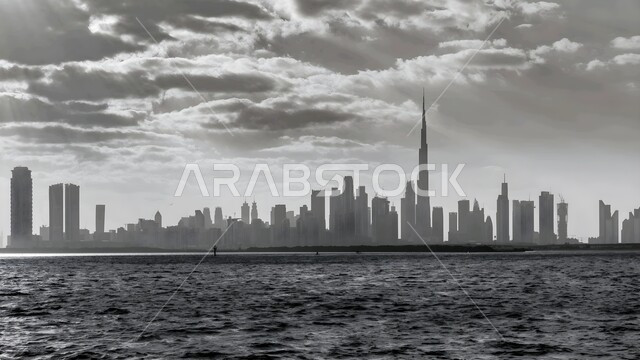 الفن الهندسي المعماري لبناء الأبراج وناطحات السحاب على الطراز الحديث, صورة بالابيض والاسود للمباني والمنشآت الشاهقة السكنية والتجارية في مدينة دبي , الأماكن السياحية المشهورة في الإمارات العربية المتحدة, جذب واستقطاب السياح من أنحاء العالم