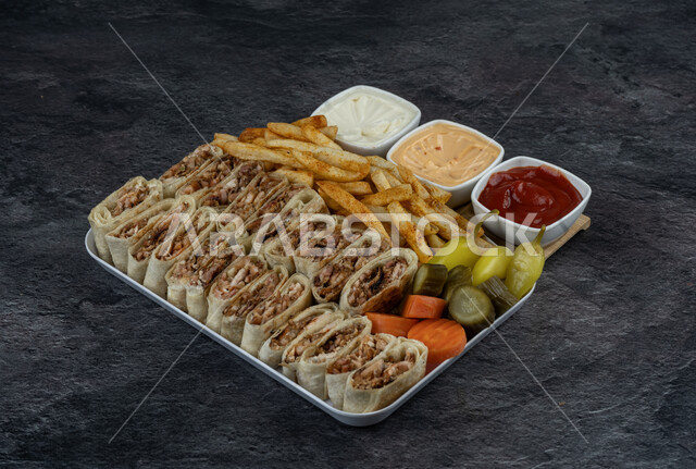 Delicious chicken shawarma sandwich in a white plate, delicious fast food meals, Arabic restaurants in Saudi Arabia, delicious food recipes, delicious foods with vegetables and sauces