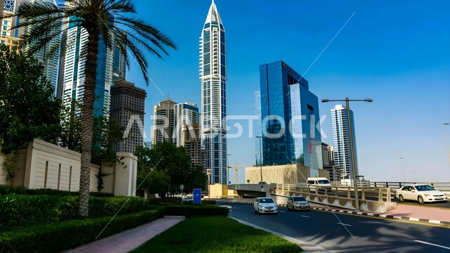 Growth, progress and urban expansion, Marina 23 Tower in Dubai, buildings and structures overlooking the sea during the day, architectural art of towers and skyscrapers, famous landmarks and tourist destinations in the United Arab Emirates