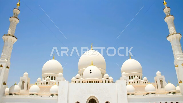 Islamic religious landmarks in the United Arab Emirates, the architectural art of building mosques in the Islamic style, Sheikh Zayed bin Sultan Al Nahyan Mosque in Abu Dhabi, the call of Muslims to perform religious duties and prayers, the concept of worship and drawing closer to God Almighty