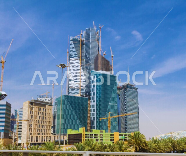 Urban progress and development, King Abdullah Financial District (KAFD) in Riyadh, architectural engineering art of building towers and skyscrapers, famous tourist places and landmarks in the Kingdom of Saudi Arabia, attracting and attracting tourists from all over the world