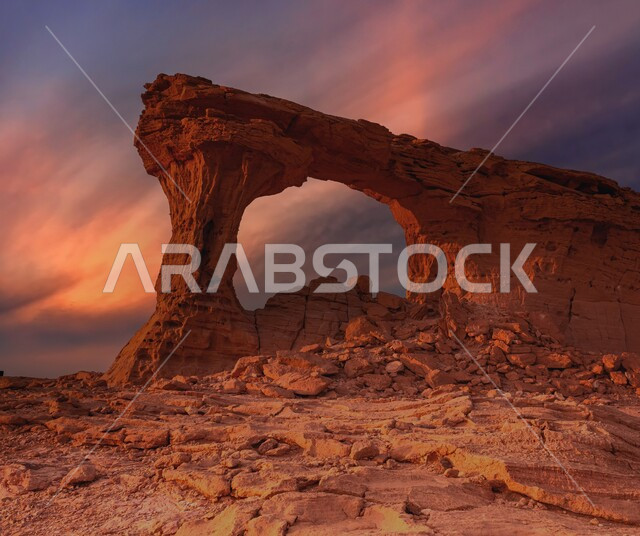 Khashm Abu Makhrouq Arch in Riyadh at sunset, rock formations and formations in the Kingdom of Saudi Arabia, the concept of ancient civilizations, historical archaeological landmarks, dry nature in desert areas, famous tourist places and landmarks