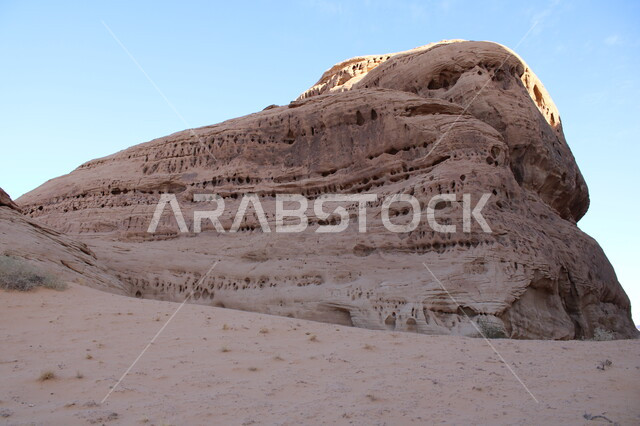 Mountain peaks and heights and rocks, rock formations and formations in AlUla in the middle of the deserts of the Kingdom of Saudi Arabia, tourist places in the desert areas, ancient historical heritage monuments in the Madain Saleh desert