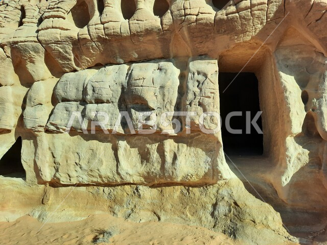 Heritage caves in the archaeological site of Al-Hijr in the desert, ancient historical landmarks in Madain Saleh, tourist places in desert areas, rock formations and formations in Al-Ula in the middle of the deserts of the Kingdom of Saudi Arabia