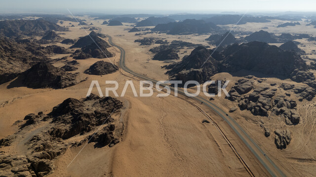 Desert areas and sand dunes in the prairies, ancient historical monuments, famous tourist places in the Kingdom of Saudi Arabia, desert nature reserves, mountain ranges and rock formations in the Tabuk region