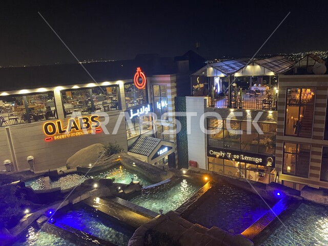 The growth and urban development of malls in Abha, famous landmarks and commercial buildings in the Kingdom of Saudi Arabia, the advanced and modern architectural art of building towers and skyscrapers