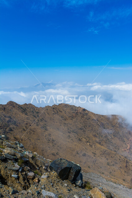 Al Hada Mountains in Taif region during the day, rock formations in mountainous areas, famous natural tourist attractions in the Kingdom of Saudi Arabia, places that attract and attract tourists from all over the world, rock formations in the peaks and heights