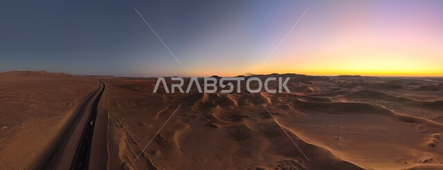 التكوينات والتشكلات الرملية في الصحاري، الكثبان الذهبية الناعمة والتضاريس الطبيعية في المملكة العربية السعودية، الجو القاسي والجاف في الأراضي القاحلة، المناظر الطبيعية والرمال الذهبية الناعمة في الصحراء عند شروق الشمس