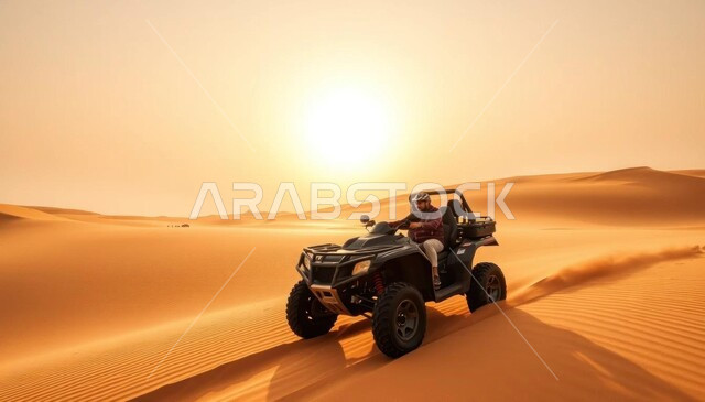 Driving a four-wheel drive vehicle (dune bashing) in the middle of the desert, a fun and entertaining desert activity, enjoying practicing your favorite hobby, an exciting adventure on the soft golden sands in the deserts of the Kingdom of Saudi Arabia, safari adventures on the sand dunes