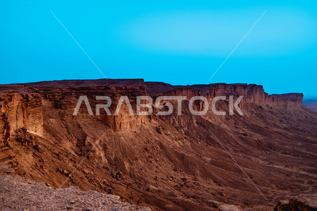 A beautiful landscape of the Tuwaiq mountain range in Riyadh in the Kingdom of Saudi Arabia, the edge of the end of the world, overlooking the Grand Canyon, distinctive tourist areas in Riyadh, tourism in the Kingdom of Saudi Arabia