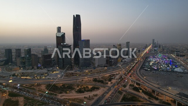 أجواء وأضواء وقت الغروب لمدينة الرياض في المملكة العربية السعودية, ملاهي وينترلاند, موسم الرياض, أماكن سياحية في المملكه العربيه السعوديه, ابراج وناطحات سحاب مدينة الملك عبد الله الاقتصاديه, شوارع وطرق مدينة الرياض الجميله
