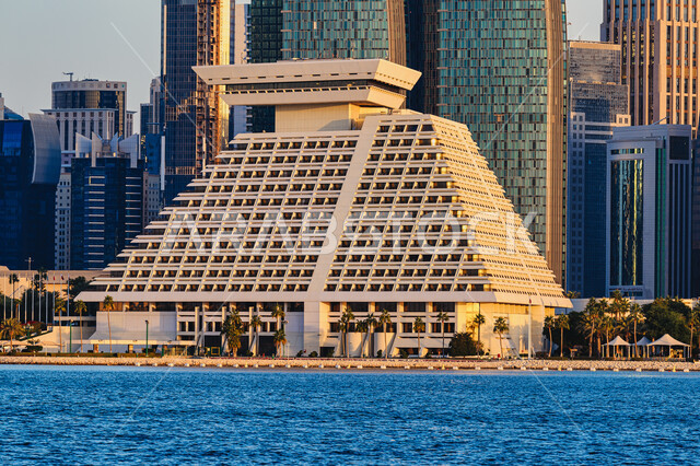 Modern architectural style of towers and skyscrapers, Sheraton Hotel overlooking the sea in Doha during the day, hotels and resorts in Qatar, famous places and landmarks, attracting and attracting tourists from all over the world