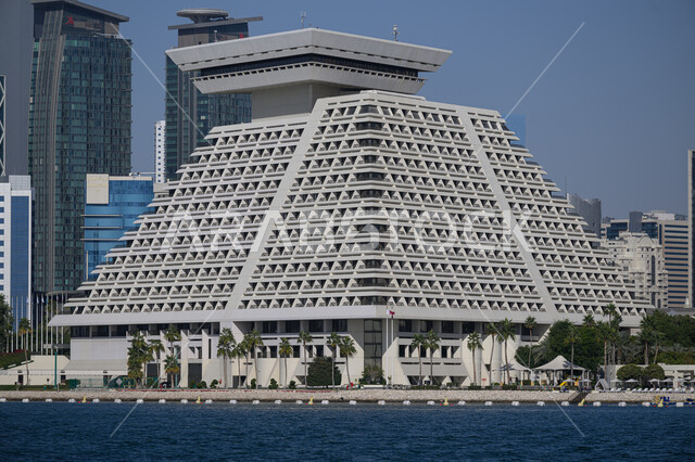 Sheraton Hotel overlooking the sea in Doha during the day, modern architecture of towers and skyscrapers, hotels and resorts in Qatar, famous places and attractions, attracting and attracting tourists from all over the world