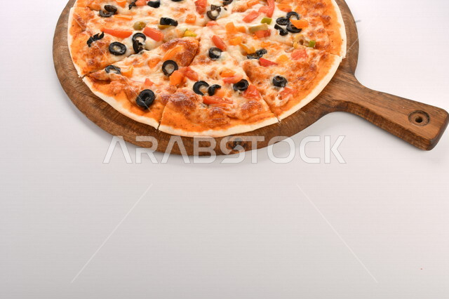 Delicious pizza pie baked with vegetables and cheese, divided pizza pie, delicious dishes, how to prepare and serve pizza