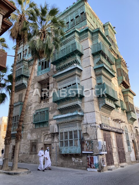 Old Arabic architectural style, historic buildings and houses in the historic Al-Balad district in Jeddah, old windows in the historic city of Saudi Arabia, a popular heritage tourist place and area, wandering around the neighborhoods and famous landmarks during the day