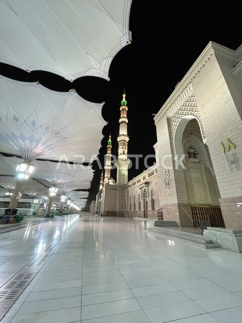 Sacred religious areas, close-up of electronic umbrellas in the courtyard of the Prophet's Mosque in Medina, Islamic places in the Kingdom of Saudi Arabia, worship and closeness to God, Saudi technical development and progress, use of umbrellas for shade and protection from the sun and rain