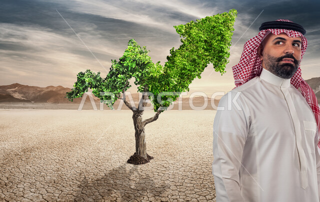رجل عربي سعودي خليجي يقف يفكر ويتامل ، خلفه شجرة على شكل مؤشر صعود الاسهم ، متابعة البورصة المالية، صعود و نزول البورصة المالية ، الاستثمار المالي و الاقتصادي ، النمو و الإزدهار الإقتصادي
