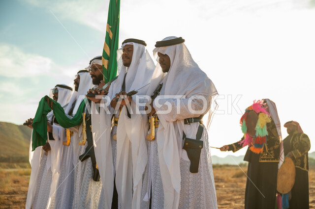 يوم بدينا ٢٢ فبراير، مفهوم حب الوطن والانتماء اليه، ذكرى تاسيس الدوله السعوديه الاولى ١٧٢٧ م، فرقة عروض الفلكلور التراثي في صحراء المملكة، ارتداء زي العرضة النجدية الشعبية في المناسبة الوطنية، الاحتفال باليوم الوطني بالرقص بالسيوف وقرع الطبول