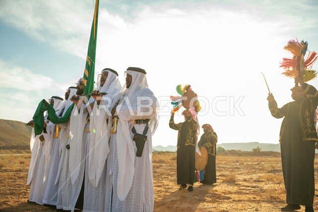 الاحتفال باليوم الوطني بالرقص بالسيوف وقرع الطبول، فرقة عروض الفلكلور التراثي في صحراء المملكة، ارتداء زي العرضة النجدية الشعبية في المناسبة الوطنية، يوم بدينا ٢٢ فبراير، مفهوم حب الوطن والانتماء اليه، ذكرى تاسيس الدوله السعوديه الاولى ١٧٢٧ م