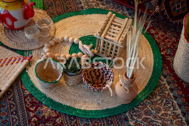 Anniversary of the founding of the first Saudi state 1727 AD, the day we started February 22, pride in the ancient Saudi heritage, displaying local national products, a popular handicraft, boasting about the historical Saudi culture, making baskets from dry palm fronds, pottery jars and vessels, rosary beads with wooden beads