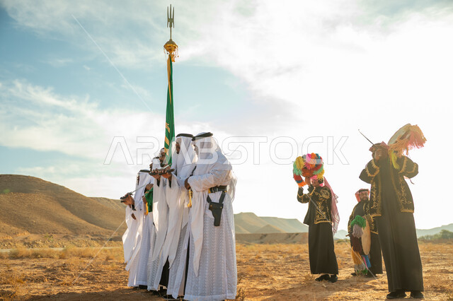 يوم بدينا ٢٢فبراير، إحياء التراث السعودي بعرض فلكلوري بإحدى المناطق الصحراوية بالمملكة، فرقة للاحتفال بالعيد الوطني بالرقص بالسيف وقرع الطبل، ذكرى تأسيس الدوله السعوديه الأولى ١٧٢٧م، مفهوم حب الوطن والانتماء إليه، ارتداء زي العرضة النجدية الشعبية بمناسبة وطنية