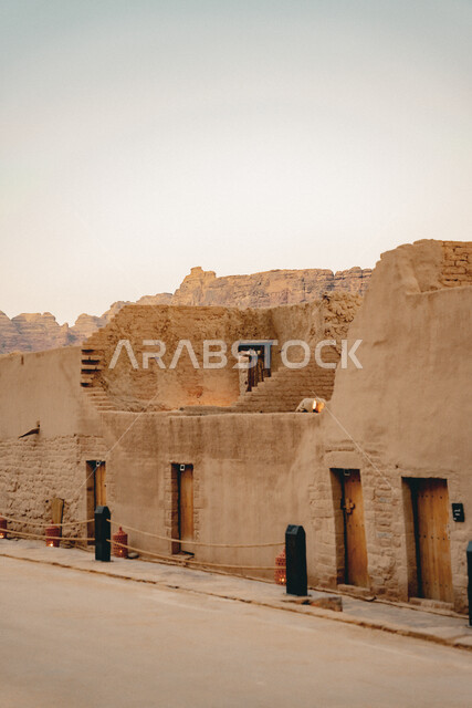 Tourism in Al-Ula, historical buildings, ancient clay architecture, famous heritage tourist places in the Kingdom of Saudi Arabia, popular clay houses in the old town