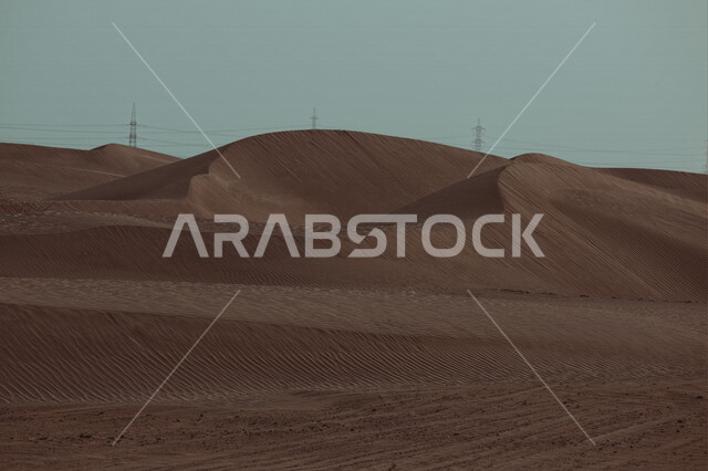 منظر جمالي للكثبان الرملية الصحراوية في المملكة العربية السعودية , الرمال الناعمة .