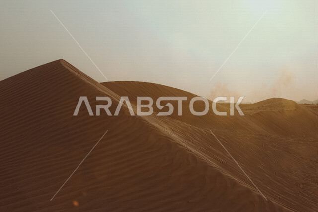 Aesthetic view of desert sand dunes in Saudi Arabia, fine sand.