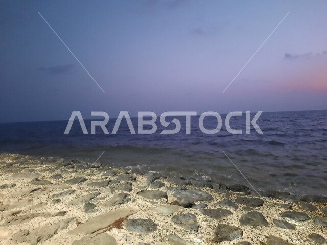 Blue water view at sunset, Jazan Corniche in Saudi Arabia, a famous natural area that attracts and attracts tourists from all over the world, having a good time in coastal cities, a place for a recreational cruise and trip, Red Sea Islands