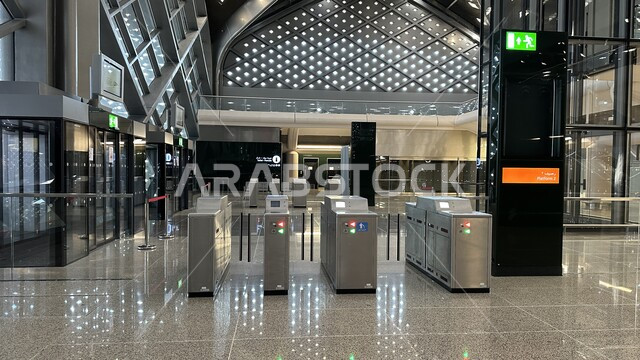 Entrance gates to platform No. 3, Haramain High Speed ​​Railway Station in the Kingdom of Saudi Arabia, a convenient means of transportation for pilgrims and Umrah performers, the engineering art of developing and advancing means of transportation, a fast electric line linking Makkah and Madinah, the ability to move from one area to another