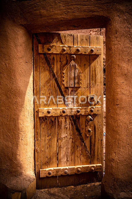 Old architectural design of ancient wooden doors, our beginning day is February 22, historical houses in the Kingdom, close-up of a wooden door, anniversary of the founding of the first Saudi state 1727 AD, authenticity of Saudi heritage