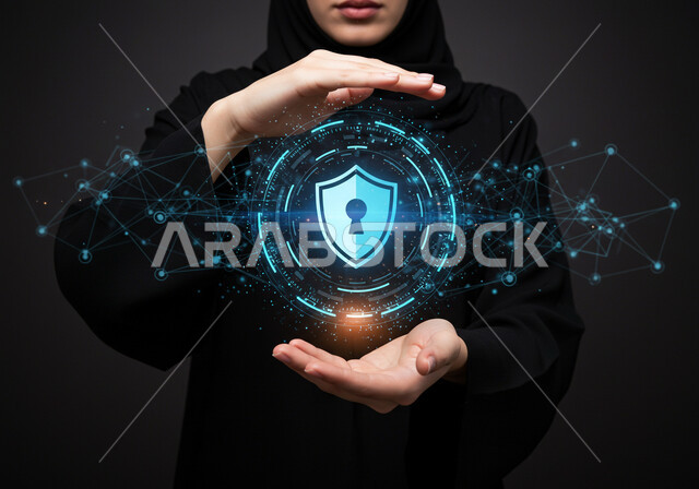 البرمجة الحاسوبية وخطوط الاتصال، حماية المعلومات وتأمينها من الهجمات، عناصر ورموز هولوجراميه ثلاثية الابعاد لقفل الأمان، مفهوم الامن السيبراني، بورتريه مقرب لامرأة عربية خليجية سعودية محجبة ترتدي عباءة سوداء تقوم بعرض عنصر هولوجرامي مضيء، خلفية سوداء