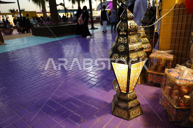 Joy of the coming of the blessed month of Ramadan, a shop selling lanterns and traditional products and accessories, the spiritual atmosphere of Ramadan in the Kingdom of Saudi Arabia, celebrating Islamic religious occasions, decorations and ornaments for the month of goodness, a traditional popular market in the city of Jeddah