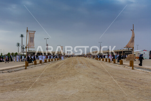 An aesthetic image of a group of camels in the annual Arab festival, the historic Souk Okaz in Taif, the beauty of tourism in the city of Taif in the Kingdom of Saudi Arabia, cultural activities and entertainment activities, ancient Arab, ancient, traditi
