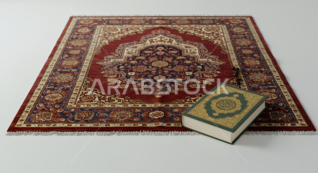 المصحف الشريف مع سجادة صلاة، مكان مخصص للعبادة والطاعة والتقرب الى الله تعالى، مفهوم التمعن بآيات وسور القرآن، الهداية بنور القرآن الكريم، اداء فريضة الصلاة على وقتها