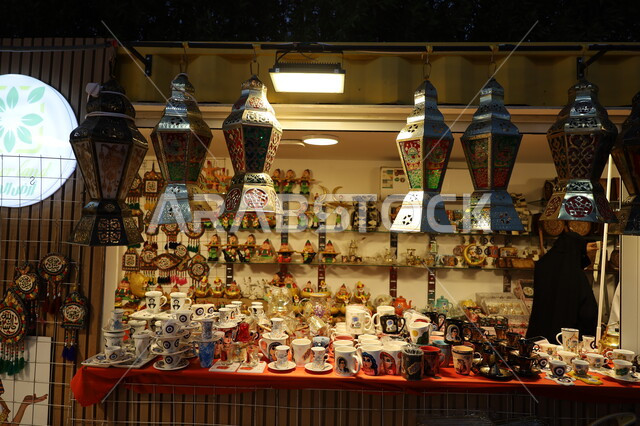 A shop selling lanterns, traditional products and accessories, the joy of the coming of the blessed month of Ramadan, the spiritual atmosphere of Ramadan in the Kingdom of Saudi Arabia, celebrating Islamic religious occasions, decorations and ornaments for the month of Khayy, a traditional popular market in the city of Jeddah