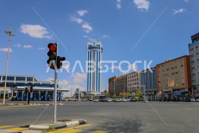 Towering skyscrapers and towering buildings, the distinctive architectural engineering art in the design of the Olaf International Hotel in Taif, urban growth and development in the Kingdom of Saudi Arabia, luxury hotels and tourist resorts, the concept of tourism in the Gulf countries, the background of the blue sky with clouds during the day