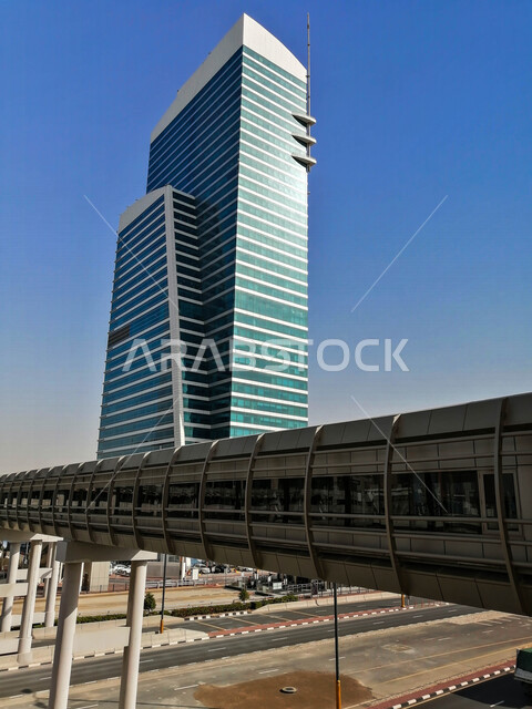 A panorama image of Dubai towers in the United Arab Emirates in daytime mode, tourism in Dubai, engineering and architectural art in Dubai, the beauty of landscapes in the Emirates, the beauty of high-rise towers and skyscrapers in the Emirates