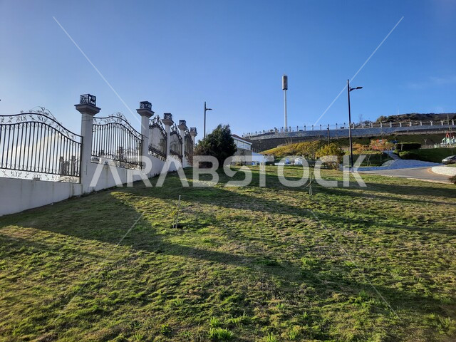 Walking and strolling in public parks, Prince Hussam Park in Al-Baha Governorate, interest in afforestation and planting green plants in parks and recreational parks, a famous tourist place and landmark, a distinctive natural landscape in the Kingdom of Saudi Arabia