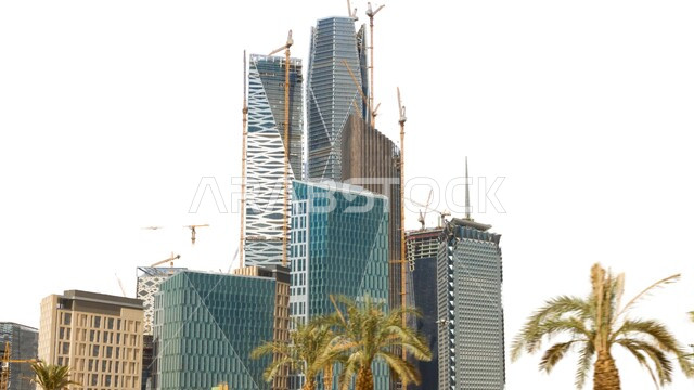 Modern and sophisticated architectural art of the towers of King Abdullah Financial District (KAFD) in Riyadh during the day, the main destination for finance and business, the growth and urban progress of skyscrapers in the Kingdom of Saudi Arabia, achieving economic and commercial renaissance, white background